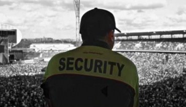 Sport event security team ensuring player safety on the field.