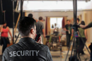 Film production security guard ensuring safe filming environment on set.