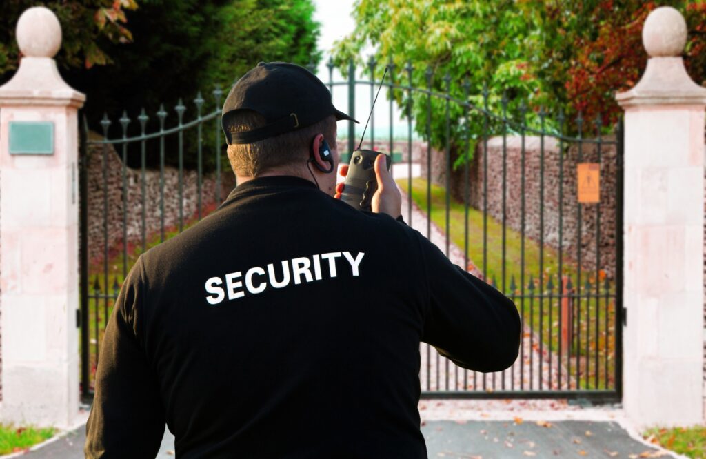 Swift Guard Security team providing professional HOA security services with advanced monitoring systems in a gated community.