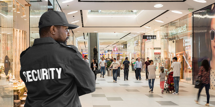 shopping mall security guard patrolling through the malls to ensure safety.